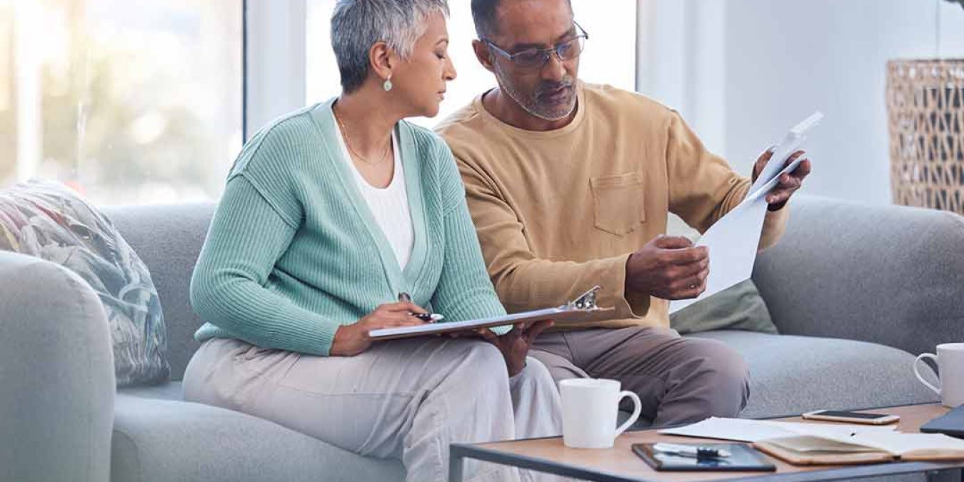 finance-documents-and-senior-couple-reviewing-documents_sm